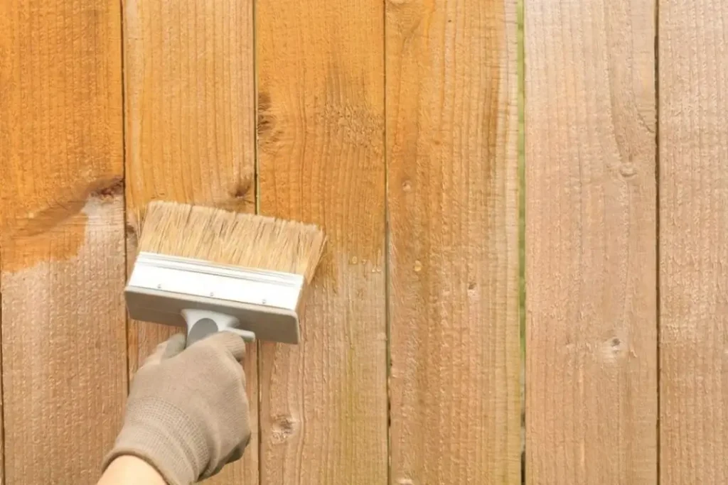 resealing a timber fence